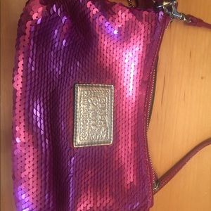 Bright pink sparkly coach purse